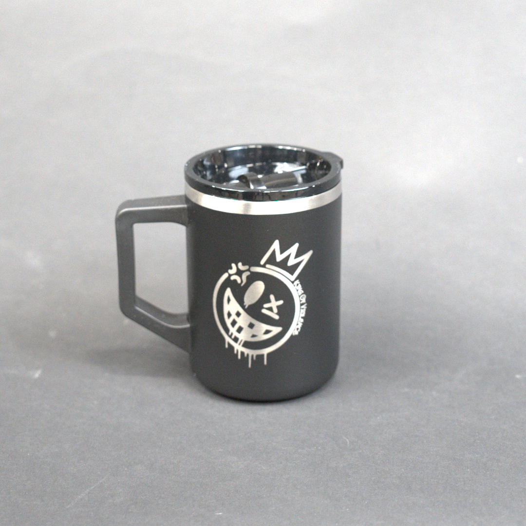 Black mug with a logo on a gray background