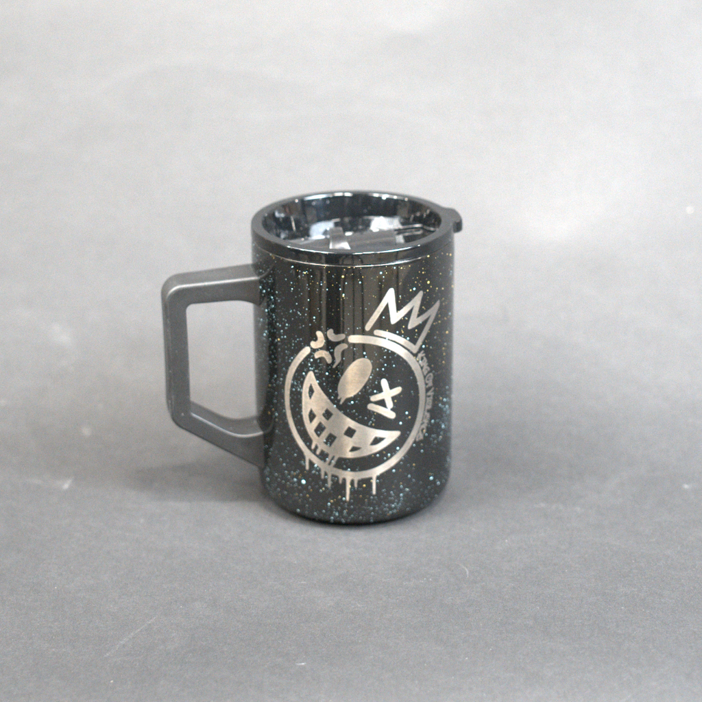 Black mug with a logo on a gray background