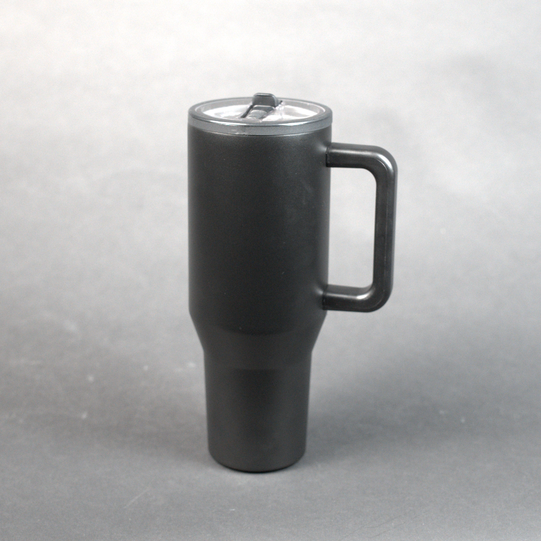 Black insulated mug with handle on a gray background